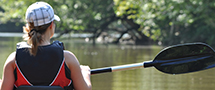 girl in canoe on river