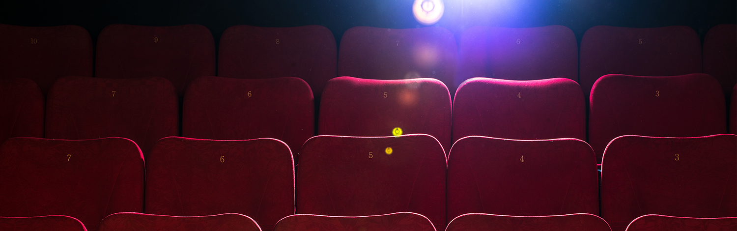 theatre seats with spotlight behind