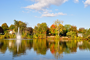scenic lake lisgar in the fall with fountain