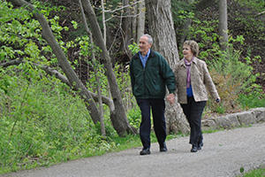 couple walking on Carroll Trail