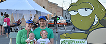 family at Turtlefest Block Party