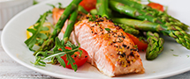 salmon on plate with asparagus