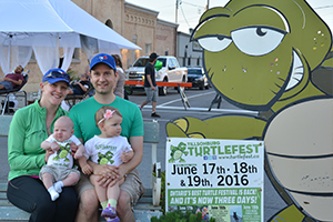 family at Turtlefest Block Party