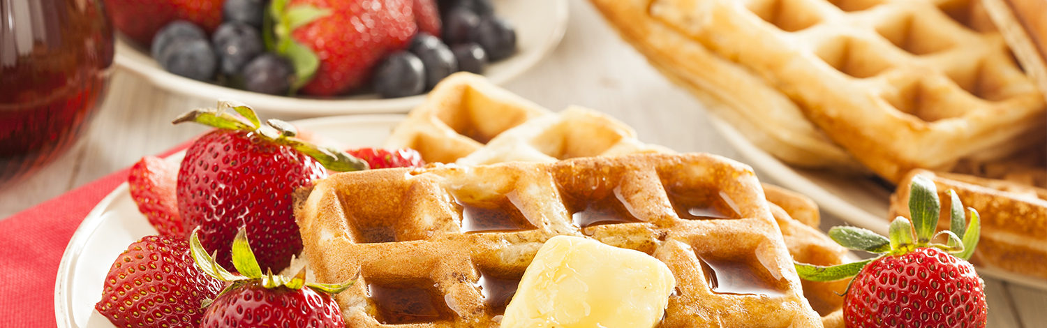 waffles and strawberries on plate